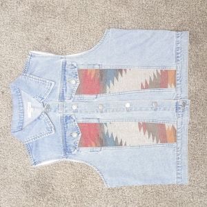 A VEVERET denim vest.